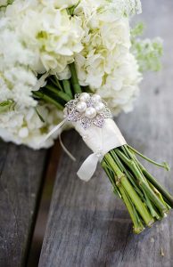 bridal bouquet with pearl brooch