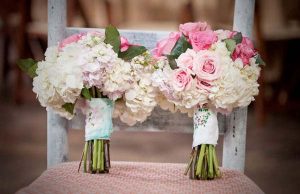 soft pink wedding bouquets with floral wrap