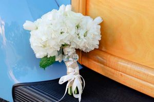white hydrangea bouquet with ribbon details