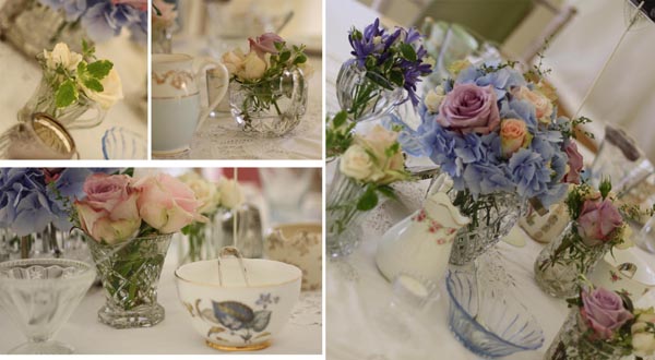 vintage wedding flowers in glass biscuit barrels