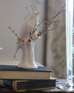 white bird vase flowes