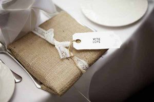rustic country wedding favour hessian wrapping paper with lace ribbon