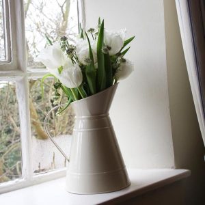 cream metal jug wedding centrepiece
