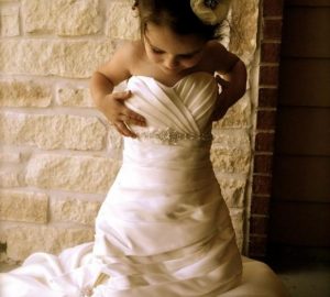 take a photo of your daughter in your wedding dress hide it and give it to her on her wedding day