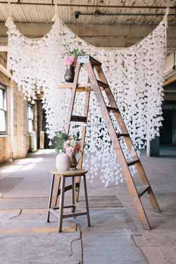 white paper origami wedding backdrop