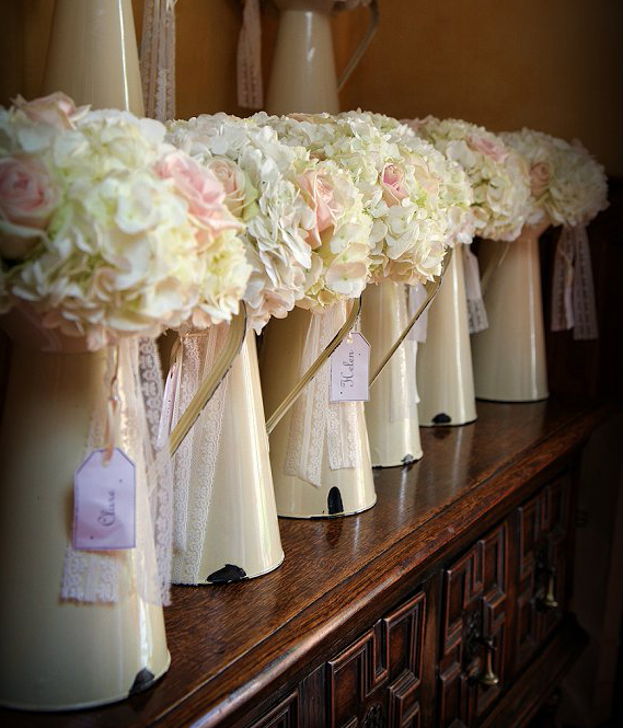 White hydrangea and blush pink rose bouquets for 8 bridesmaids make 