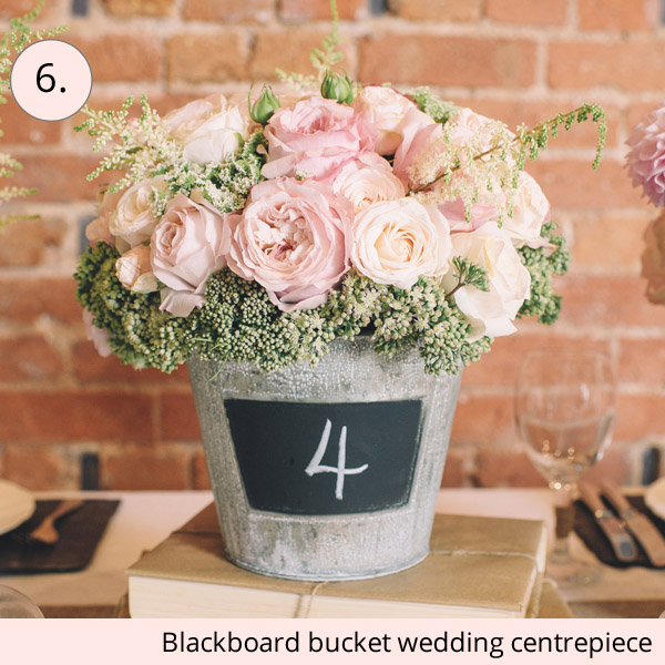 chalkboard bucket rustic wedding centrepiece ideas - 15 wedding centrepieces for under 15 pounds (budget friendly centrepieces)