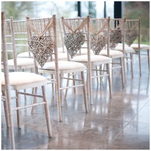 hessian wedding ideas burlap ribbon on wicker hearts for pew ends