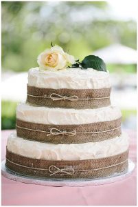 hessian wedding ideas wedding cake with burlap ribbon around layers