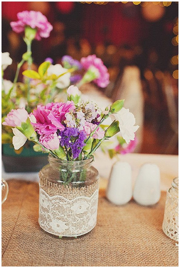 hessian wedding ideas wrap hessian and lace around ja jars for wedding centrpieces with flowers