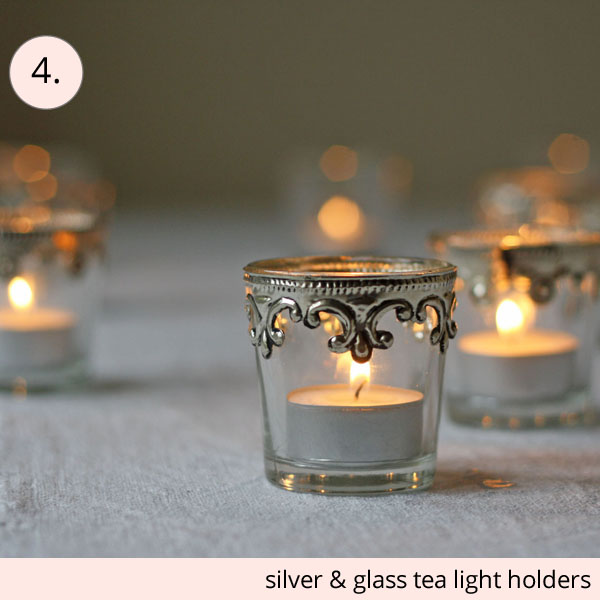 silver and glass tea light holders