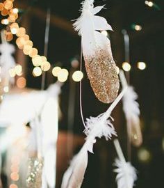 feather dipped in gold glitter