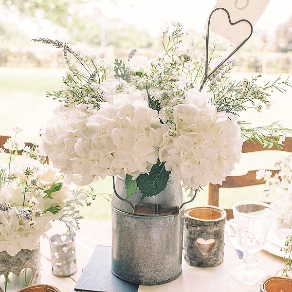 silver milk churn rustic wedding centrepiece