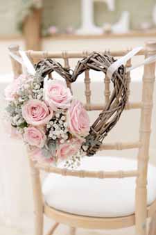 blush pink wedding ideas heart chair backs for the bride and grooms chairs