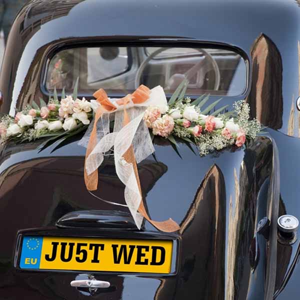 JU5T WED wedding car number plate