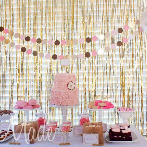 gold surtain backdrop for wedding dessert tables