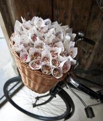 paper confetti cones in a bicycle basket