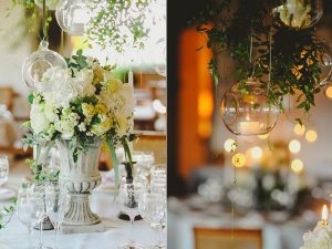 tuscan wedding centrepieces grey urns with hanging glass vases