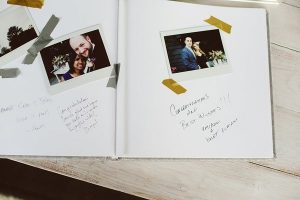 ask guests to take a polaroid photo and stick into wedding guest book next to their message