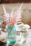 blue and blush pink wedding idea pink astilbe in blue mason jar