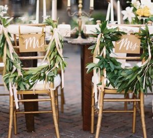 chair back ideas for summer weddings foliage garland with mr and mrs signs