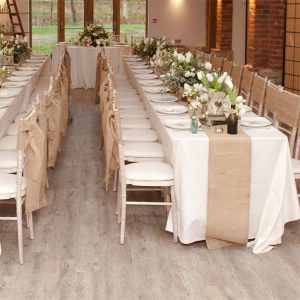 hessian table runners for woodland weddings - these look good on long tables and round tables