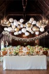 white paper lanterns above dessrt table available from www.theweddingofmydreams.co.uk