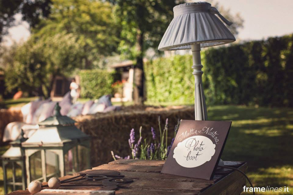 rustic crate to display photo booth sign at wedding