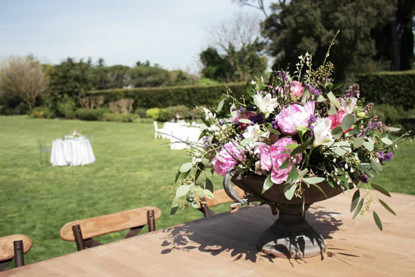 rustic urn wedding centrepieces