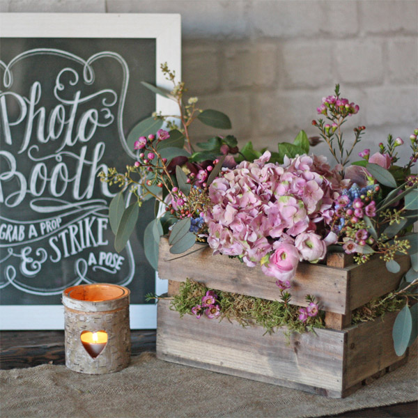 wooden crate wedding centrepiece - lovely small wooden box for flowers on the tables