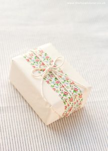 use washi tape to finish of bridesmaid gift wrapping