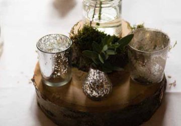 woodland wedding centrepiece tree slice mercury silver vases candle holders