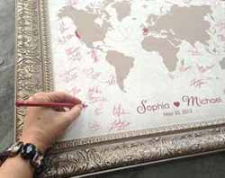 ask guests to sign a world map - wedding guest book ideas for travle wedding theme