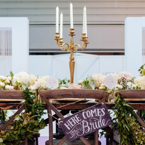 gold candelabra wedding centrepiece