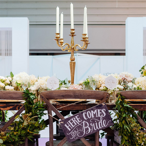 gold candelabra wedding centrepiece