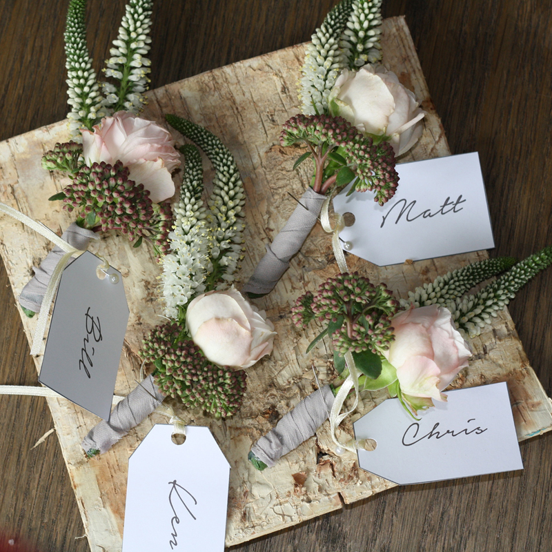 rustic button holes presented on birch bark