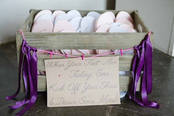 Flip Flops in a Wooden Crate For When Guests Want to Carry On Dancing