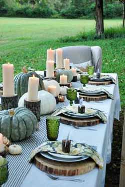halloween wedding ideas - pumpkins and gourds with rustic bark stree stumps as long table decorations