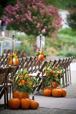 halloween wedding ideas - pumpkins to the mark entrance to the aisle