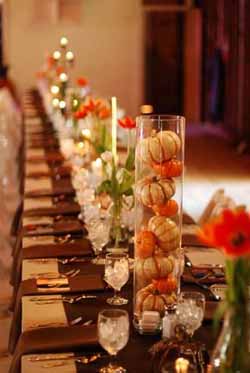 halloween wedding ideas - small pumpkins in cylinder vases for wedding table decorations