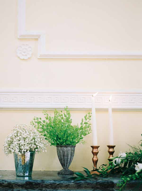 wedding fireplace ideas with candles urns candle sticks and foliage (1)