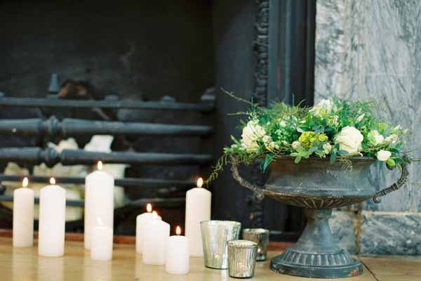 wedding fireplace ideas with candles urns candle sticks and foliage (2)