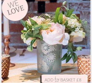 gold vase wedding centrepiece with floral pattern