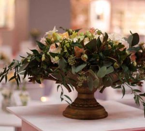 rustic footed gold urn wedding centrepiece