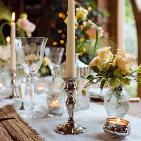 silver-candle-sticks-winter-wedding-decorations