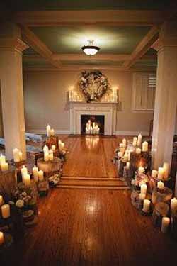 woodland ceremony ideas tree stumps and candles down aisle