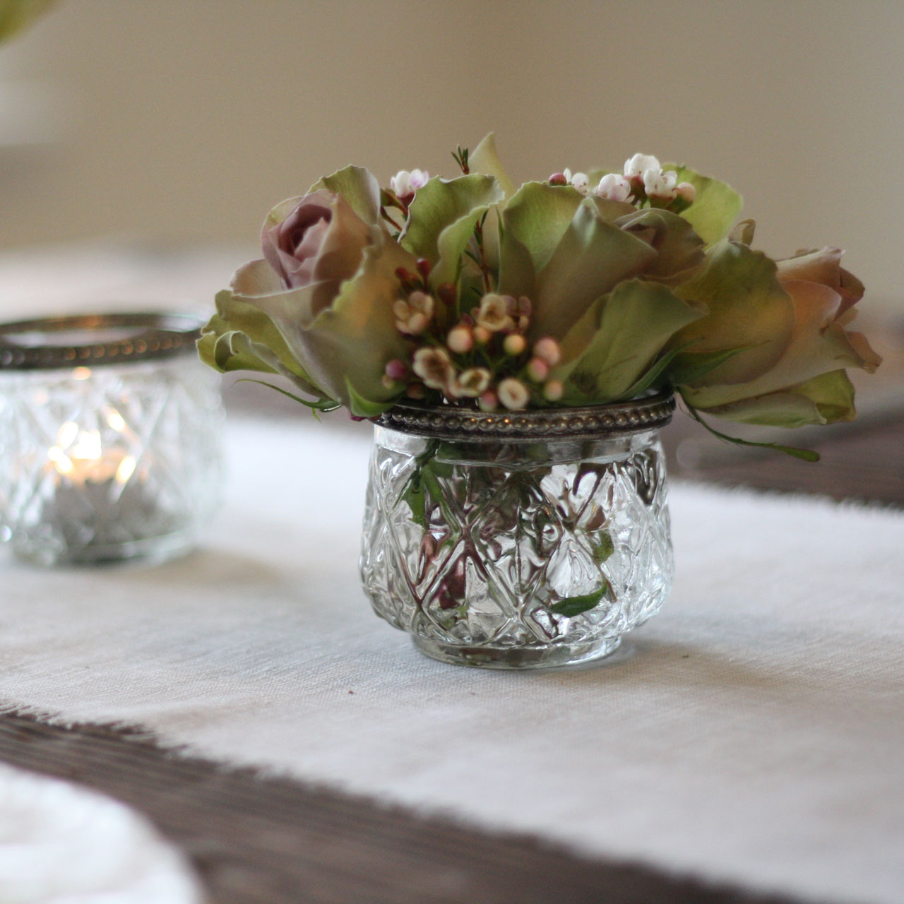 An elegant pressed glass bud vase or candle holder - available from @theweddingomd