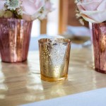 gold-tea-light-holders-by-@theweddingomd-metallic-wedding-ideas