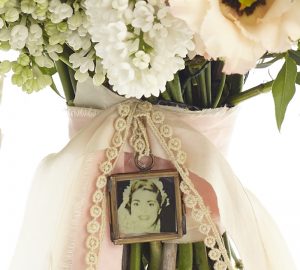 tiny photo frame for wedding bouquet available from @theweddingomd