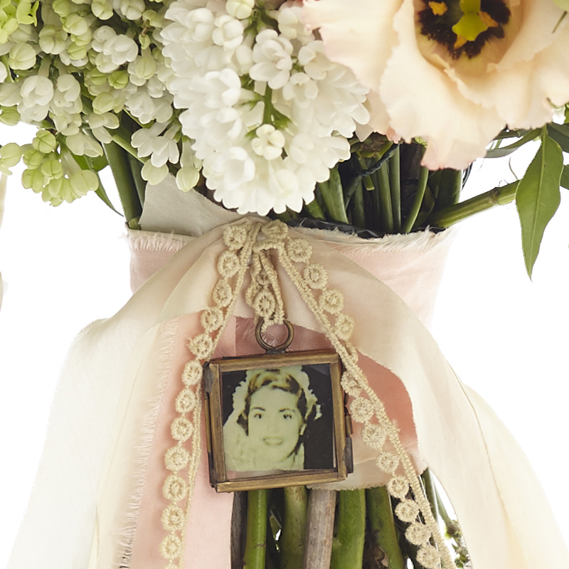 tiny photo frame for wedding bouquet available from @theweddingomd